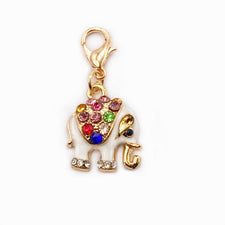 gold and white elephant jewelry charms with tiny colorful crystals