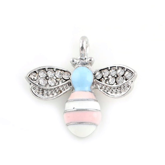 silver blue pink and white jewelry charms that look like bees