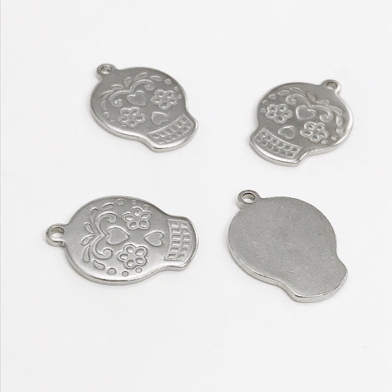 stainless steel jewelry charms that look like skulls