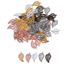 pile of jewelry charms that look like leaves