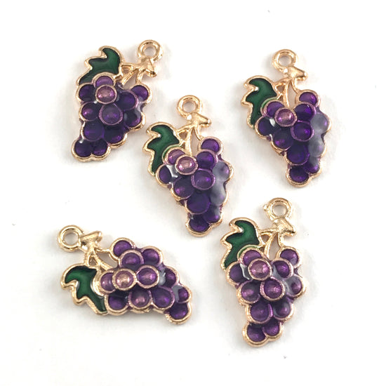 purple green and gold jewerly charms that look like a bunch of grapes