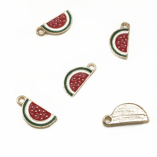five jewelry charms that look like watermelon slices