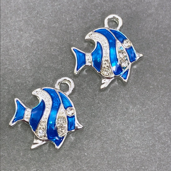 two blue and silver enamel fish shaped jewelry charms
