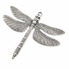 large silver color jewelry pendant shaped like a dragonfly