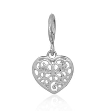 silver jewelry charm in a filigree heart design