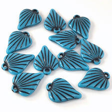 blue and black leaf shaped charms