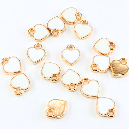 15 white and gold heart shaped jewelry charms