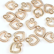 15 white and gold colour heart shaped jewerly charms