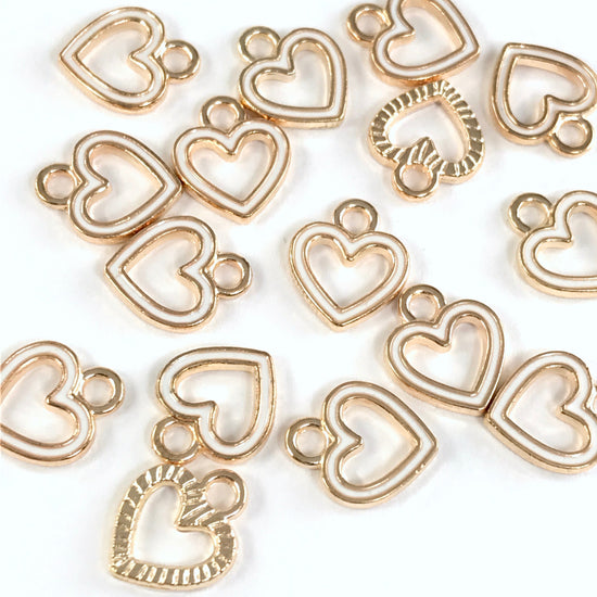 15 white and gold colour heart shaped jewerly charms