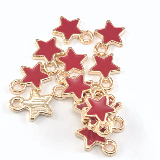 15 star shaped jewelry charms that are red and gold