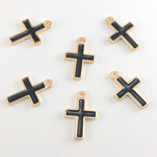 black and gold cross shaped jewelry charms