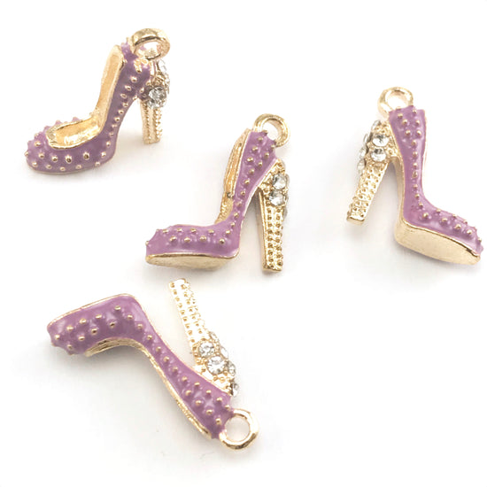 4 purple and gold colour jewerly charms that look like high heel shoes