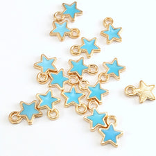 blue and gold colour jewelry charms shaped like stars