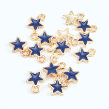 navy blue and gold colour jewerly charms shaped like stars