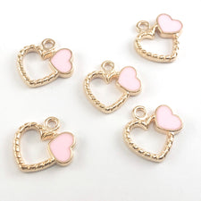 pink and gold colour charms shaped like hearts
