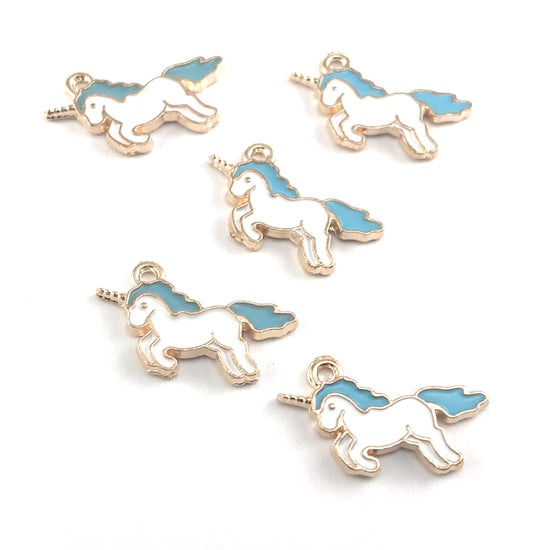 white blue and gold colour jewerly charms that look lke unicorns