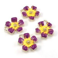 yellow, purple and gold colour jewerly charms shaped like flowers