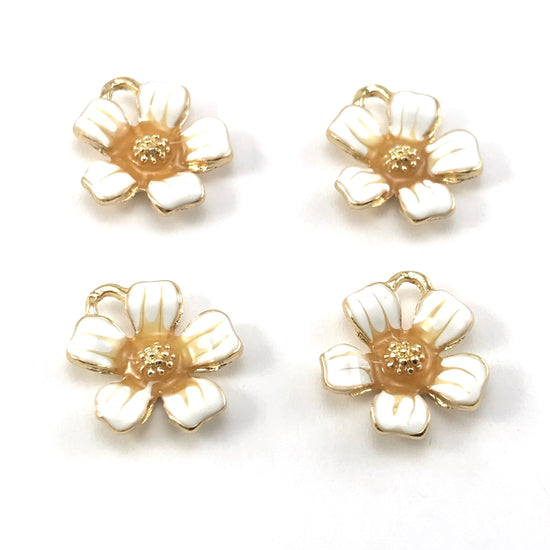 white beige and gold colour jewelry charms shaped like flowers