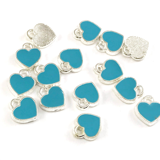 blue and silver heart shaped jewerly charms