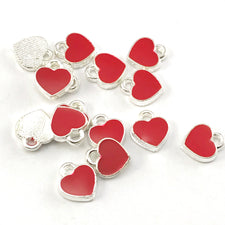 red and silver heart shaped jewerly charms
