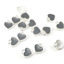 grey and silver heart shaped jewerly charms