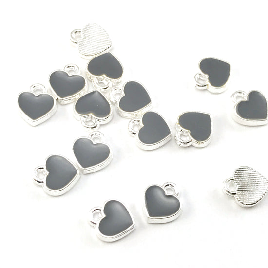 grey and silver heart shaped jewerly charms