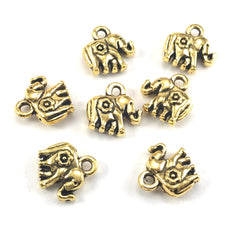antique gold colour jewerly charms that look like elephants