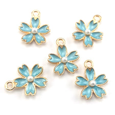 blue and gold colour jewerly charms shaped like flowers