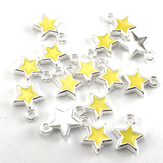yelllow and silver star shaped jewerly charms