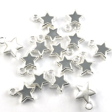 grey and silver colour star shaped jewelry charms