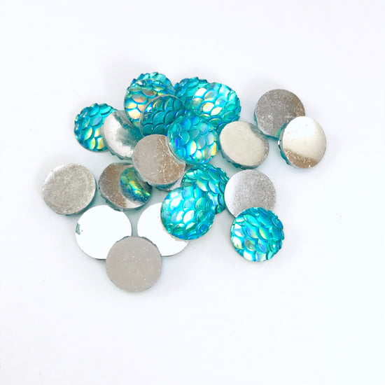 blue cabochons that have the look of fish scales
