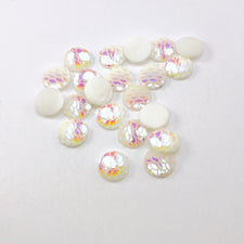 white resin cabochons with fish scale look