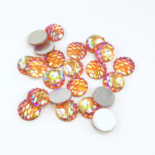 orange resin cabochons with fish scale look