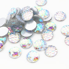 silver resin cabochons with a fish scale look
