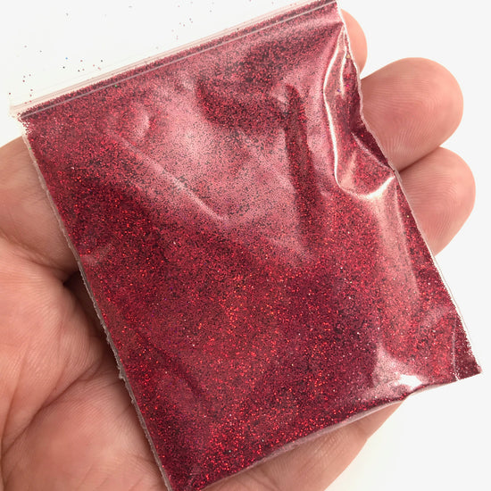bag of red holographic glitter