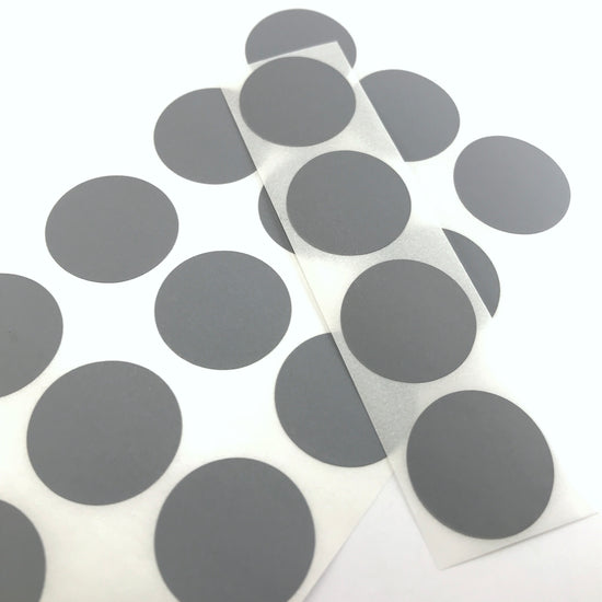 round grey stickers on a sheet