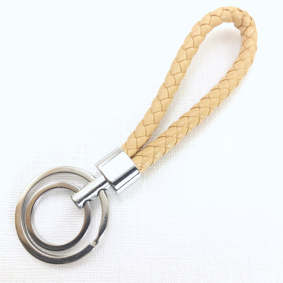 key chain with beige rope loop and silver key rings