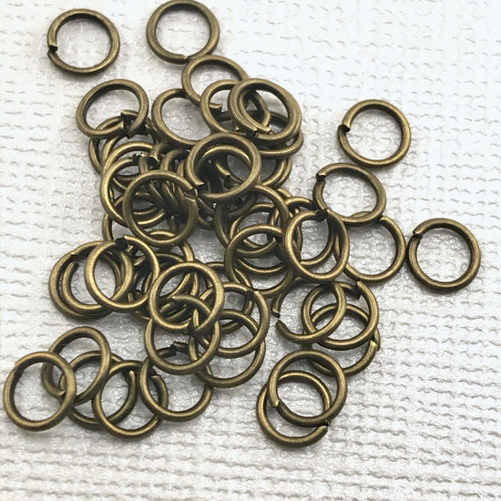Pile of bronze open jump rings