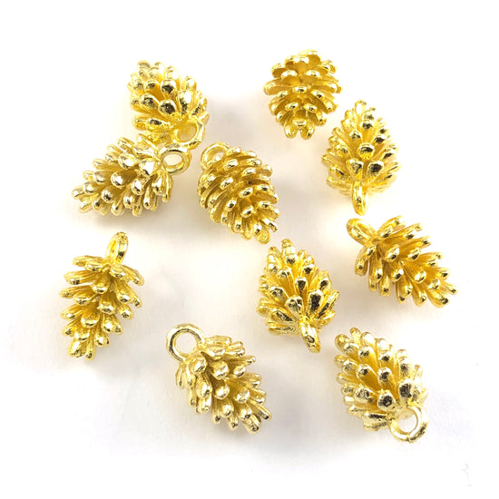 gold colour jewerly charms that look like pine cones