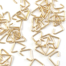 gold colour triangle shaped jump rings