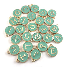 Green and gold round letter charms