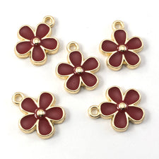 dark red and gold flower shaped jewelry charms