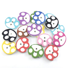 mixed colour buttons that are shaped like paws