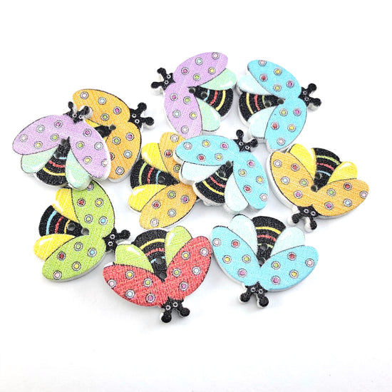 multi coloured buttons that look like bees