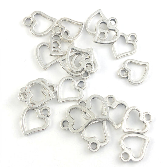 silver colour heart shaped jewerly charms