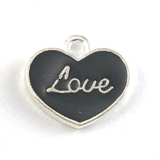 heart shaped black and silver charms with the word love on them