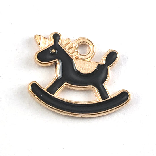 black and gold colour jewerly charms that look like rocking horses