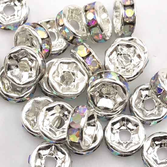 pile of silver and Crystal AB color rondelle jewelry beads