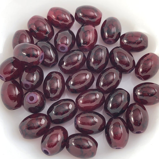 red oval shaped jewerly beads