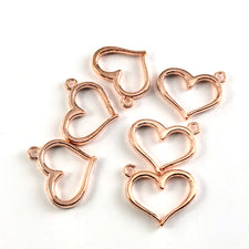 rose gold colour heart shaped charms
